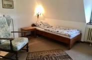 Stilvoll möblierte und komfortabel ausgestattete Zimmer